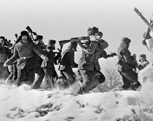 Chinese and Russian border guards fighting each other with non-deadly weapons